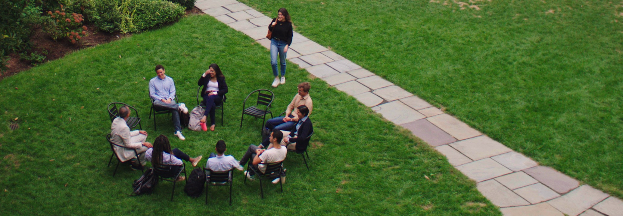 Students And Professor In Courtyard