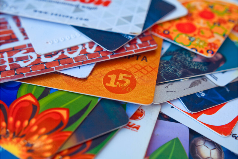 a pile of colorful gift cards