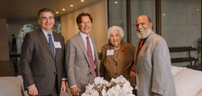 Four alumni at an event in Miami