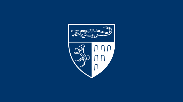Yale Law School shield on blue background