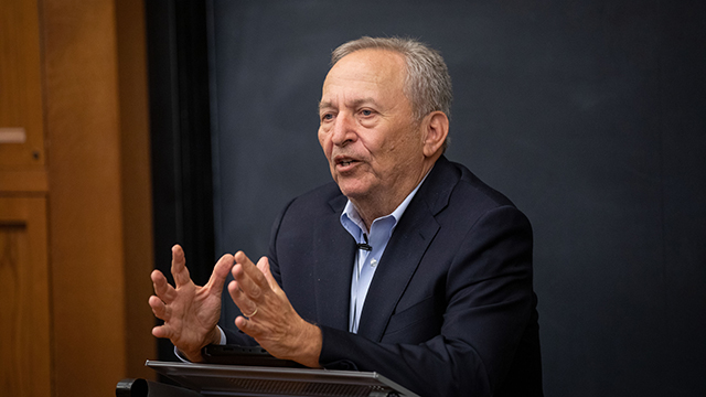 Lawrence Summers speaking at lectern