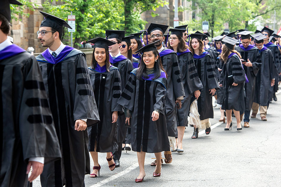 A photo of graduates marching in 2019 