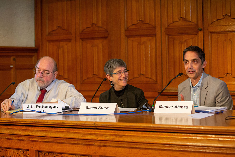 Professor J.L. Pottenger Jr. ’75, Susan Sturm, and Deputy Dean for Experiential Education Muneer Ahmad at a panel in April 2022