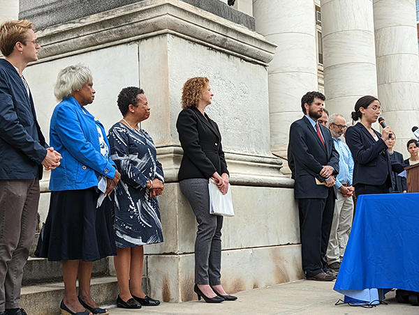 press conference in front of a courthouse in New Haven