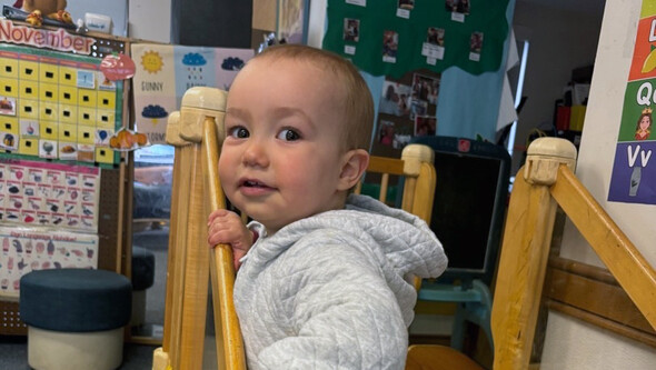 a child looking over their shoulder