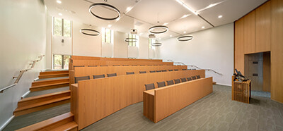 A view of a classroom in Baker Hall with tiered seating.