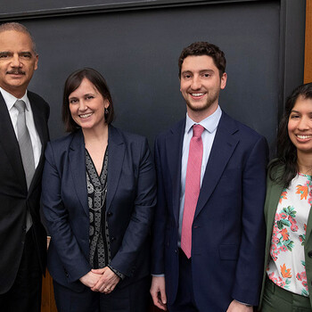 Former Attorney General Eric Holder, Professor Cristina Rodríguez, Josh Rubin ’20, and Nikita Lalwani ’20.