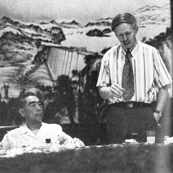 Professor Cohen stands next to Chinese Premier Zhou Enlai, who is seated.