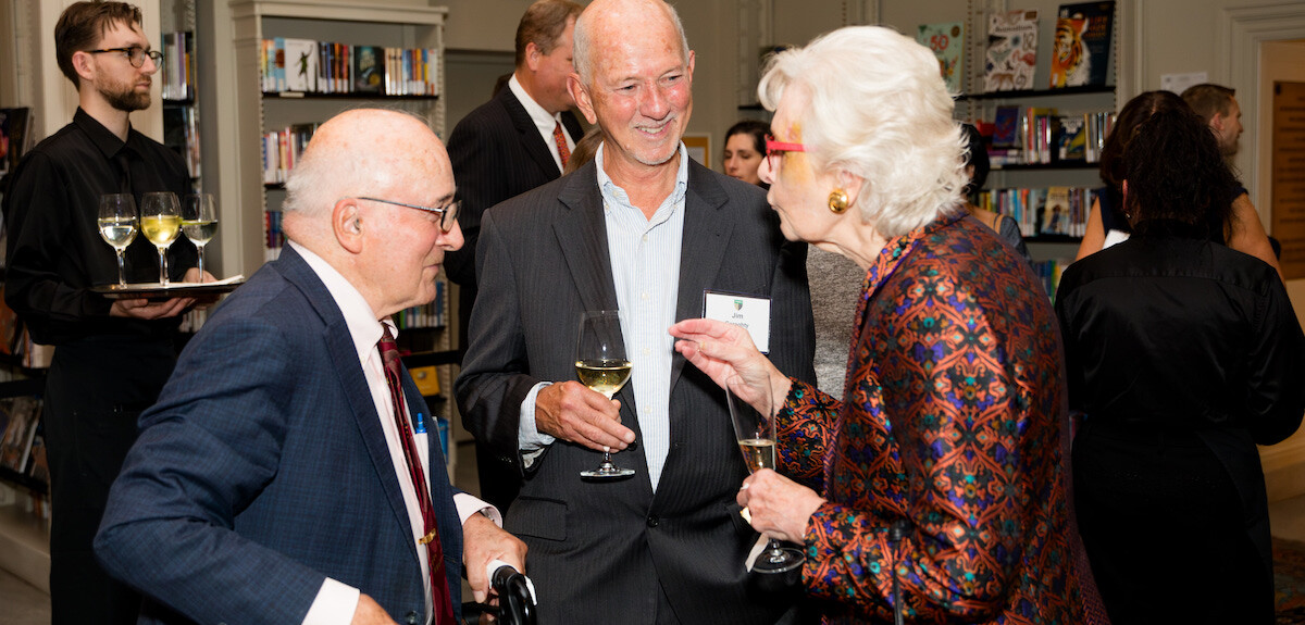 Alumni in conversation at regional event