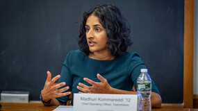 Madhuri Kommareddi speaking to an audience