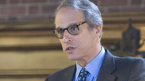 Photograph of Michael A. Varet '65 speaking at Alumni Weekend 2008