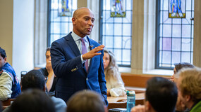 Deval Patrick speaks in a classroom of students